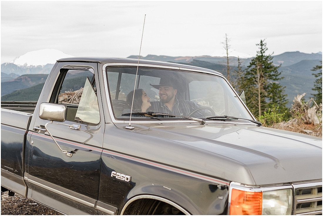 "Engagement session with pickup truck", "Pickup truck photo session", "Mountain photo session", "Washington State photographer", "PNW couple photographer", "Western style engagement pictures"