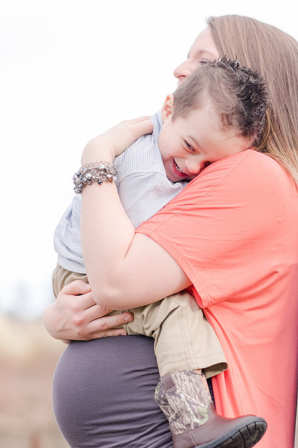 "Maternity pictures with sibling"