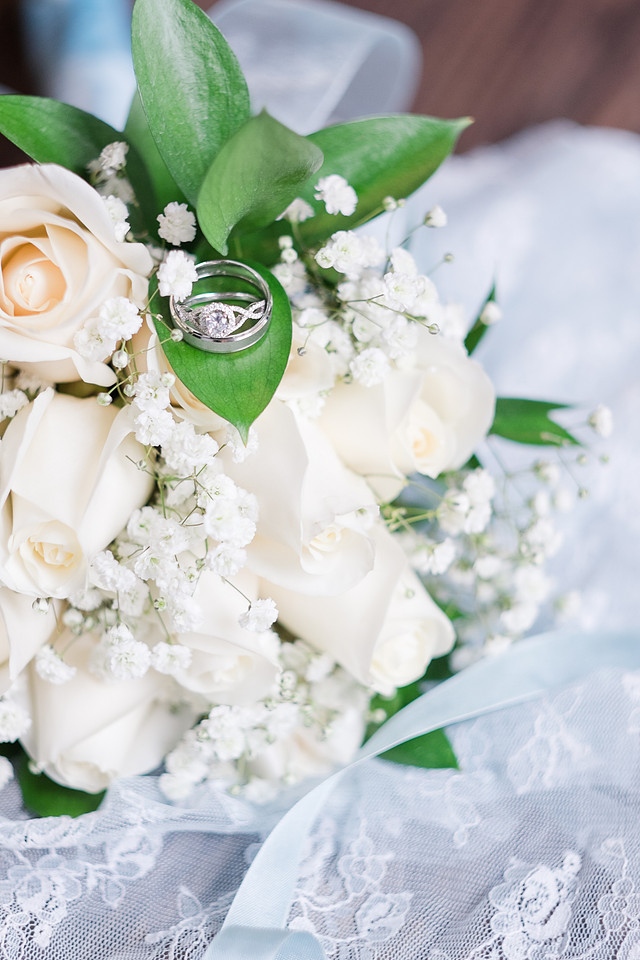 Bridal bouquet, wedding rings