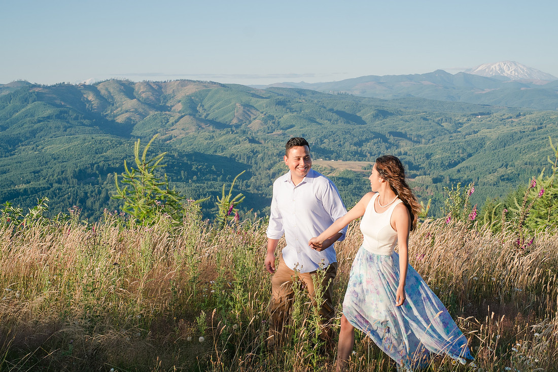 "Washington state photographer", "hilltop engagement session", "photo session with a view", "mountain view photo session", "latino couple", "couple photography", "engagement pictures", "wild flowers", "summer engagement pictures"
