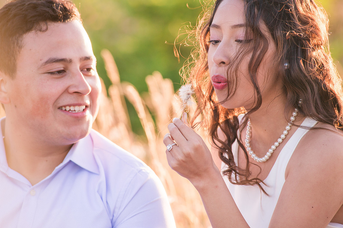 "Washington state photographer", "hilltop engagement session", "photo session with a view", "mountain view photo session", "latino couple", "couple photography", "engagement pictures", "wild flowers", "summer engagement pictures"