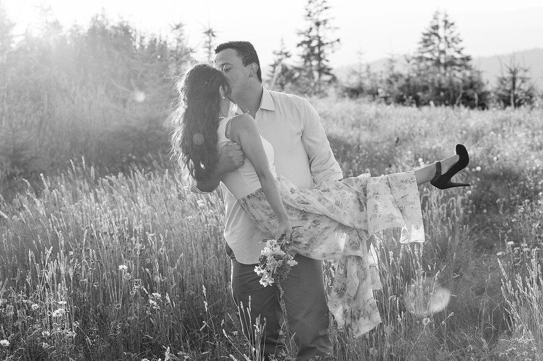 "Washington state photographer", "hilltop engagement session", "photo session with a view", "mountain view photo session", "latino couple", "couple photography", "engagement pictures", "wild flowers", "summer engagement pictures"