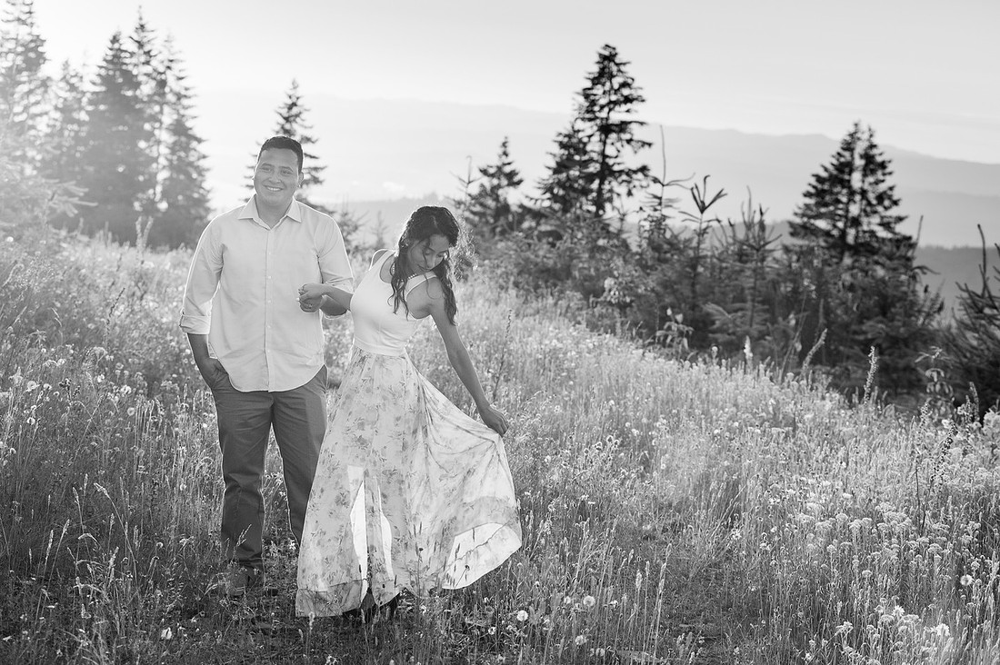 "Washington state photographer", "hilltop engagement session", "photo session with a view", "mountain view photo session", "latino couple", "couple photography", "engagement pictures", "wild flowers", "summer engagement pictures"