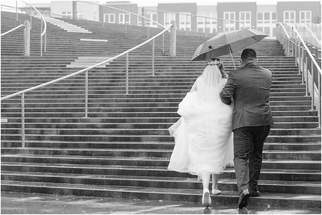"rainy wedding day", "Pink bouquets", 