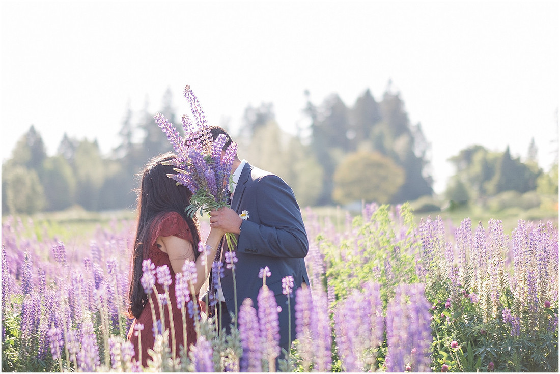 "wildflower engagement photos", "purple lupines", "spring engagement"