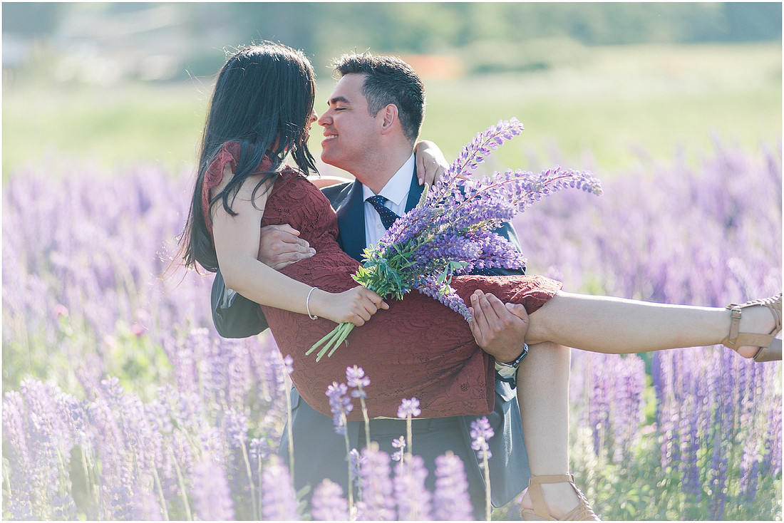 "wildflower engagement photos", "purple lupines", "spring engagement"