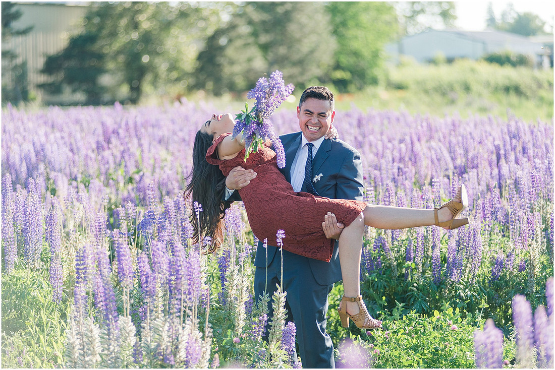"wildflower engagement photos", "purple lupines", "spring engagement"