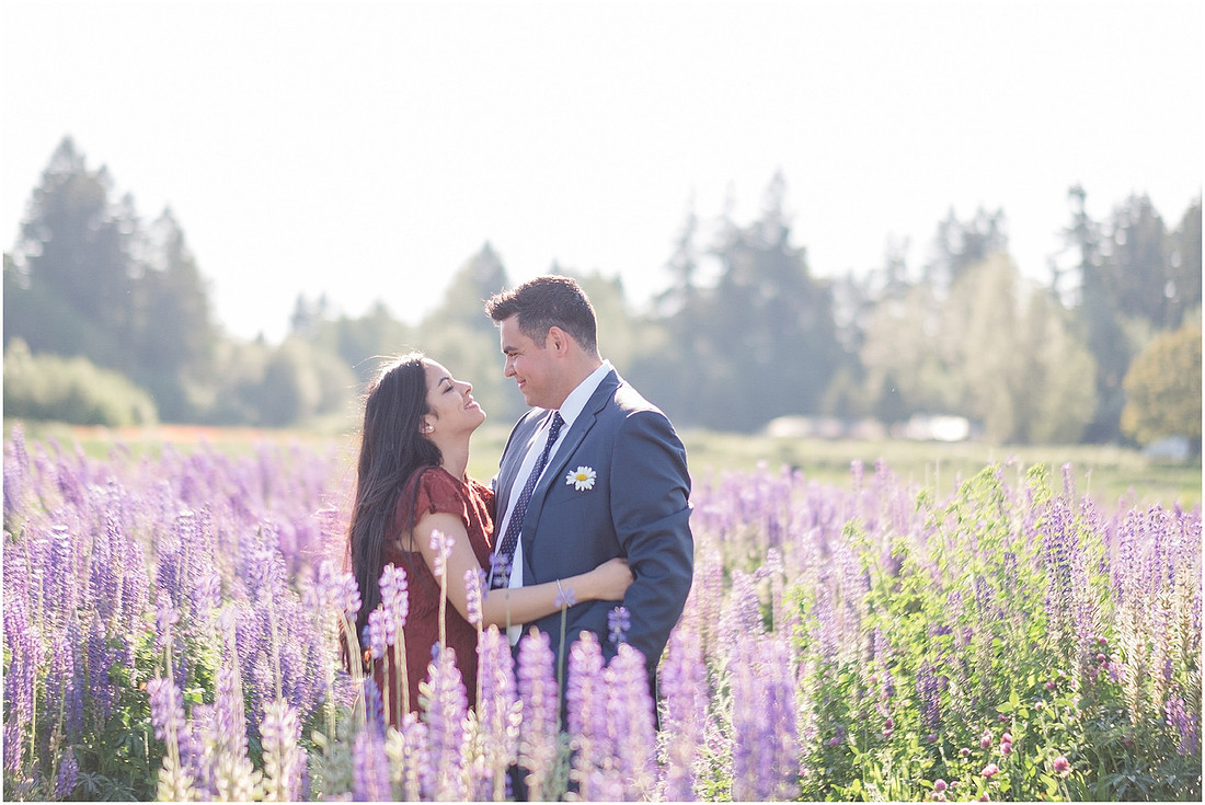 "wildflower engagement photos", "purple lupines", "spring engagement"